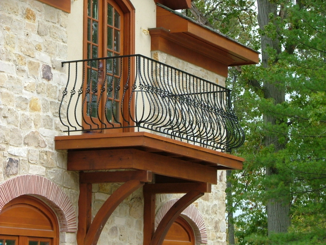 Transform Your Curb Appeal: The Elegance and Security of Wrought Iron Belly Bar Grills